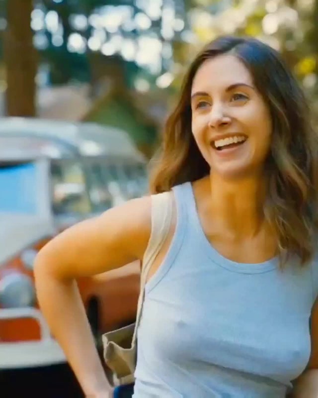 In a casual top in “Somebody I Used To Know” (2023)