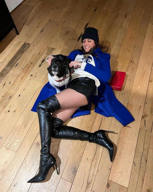 nina with a pup from twitter december 5 2022