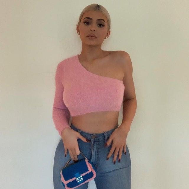 Wearing a Pink One Shoulder Sweater