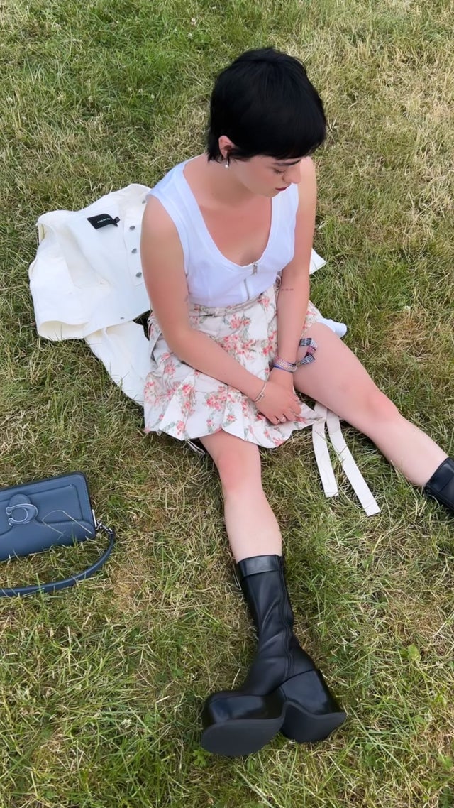 Maisie sitting on grass