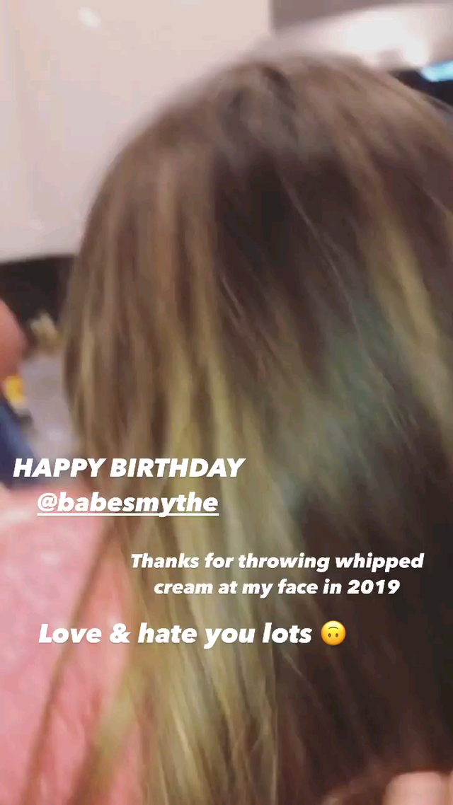 Whipped cream on her face